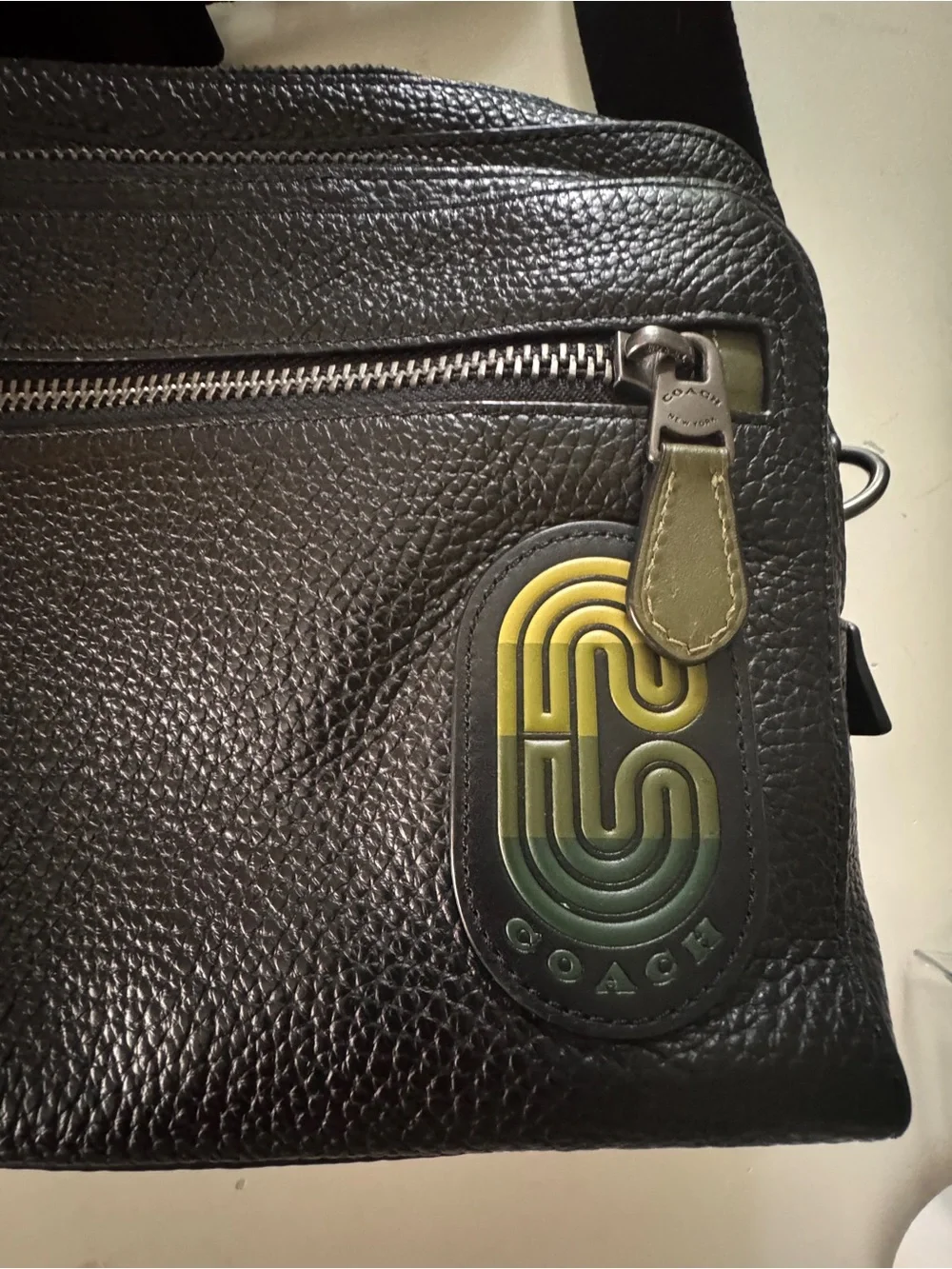 Coach Black Pebbled Leather Messenger Crossbody with Green Accent Tag